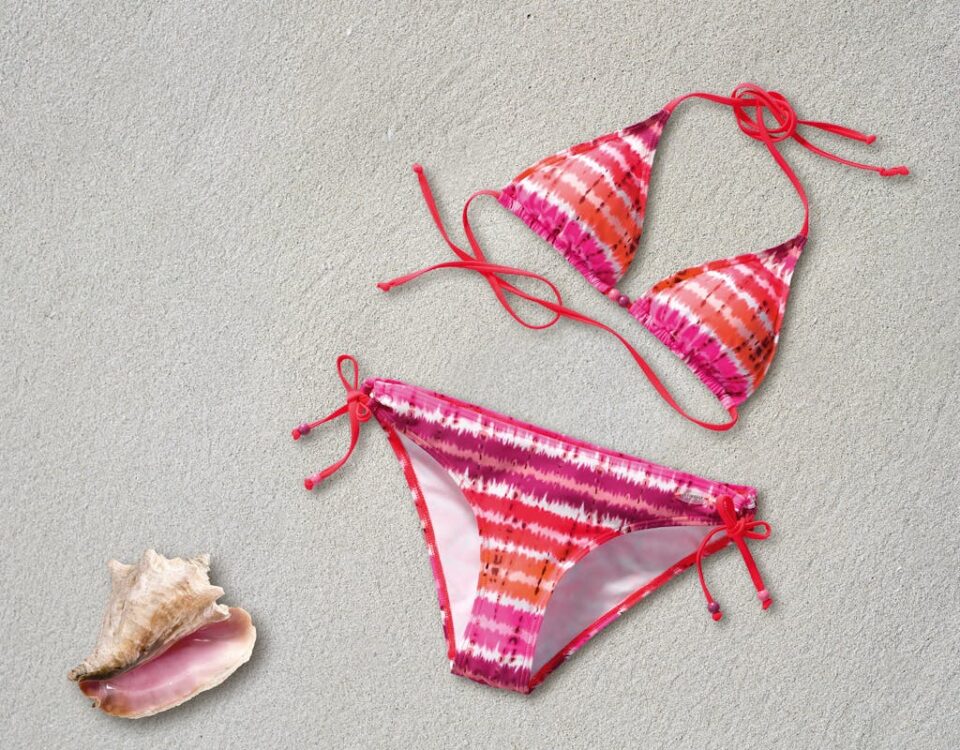 Orange Pink White Stripe Bikini Near Shell on Sand Beach